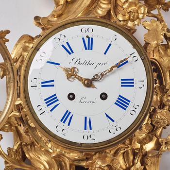 A French Louis XV gilt bronze clock marked Balthazard Paris.