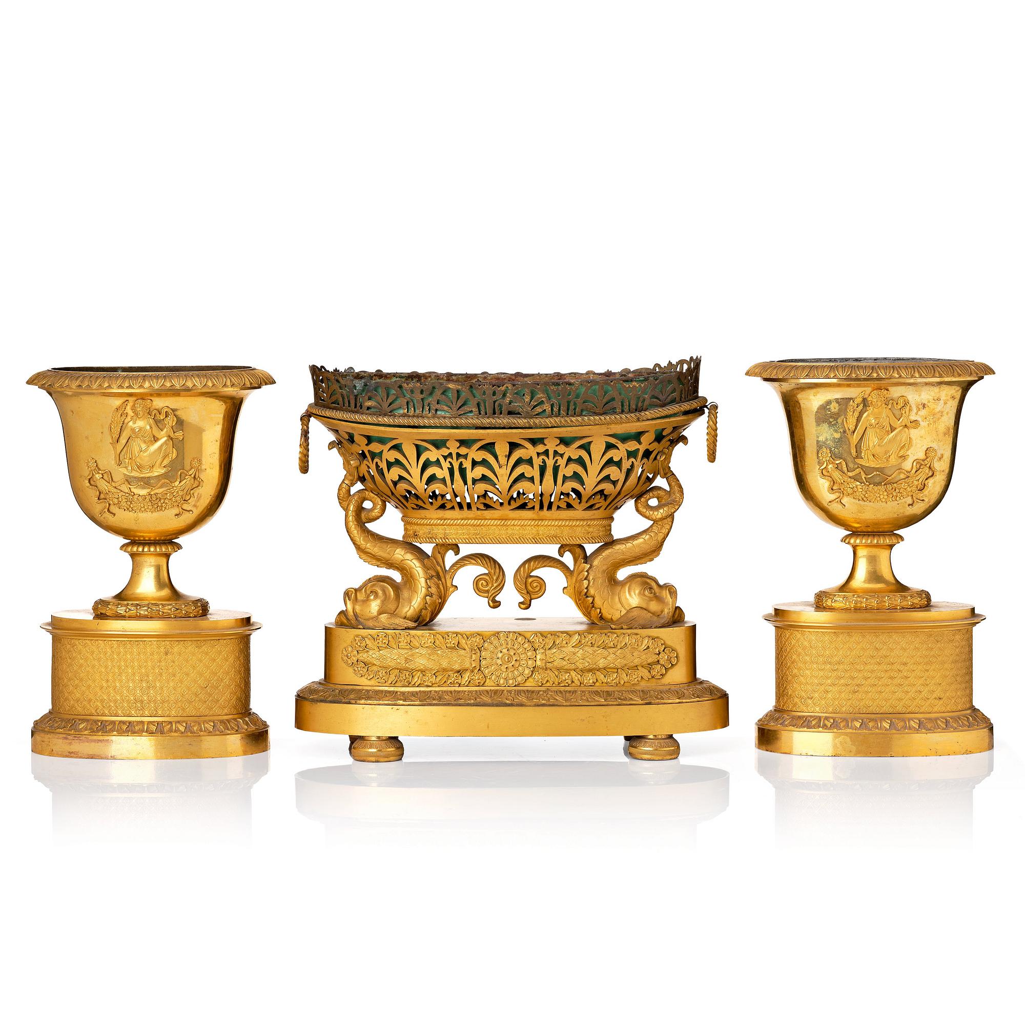 A set of three French Empire early 19th century gilt bronze centre pieces.