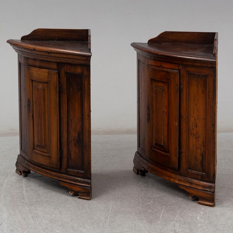 Two 19th century corner cabinets.