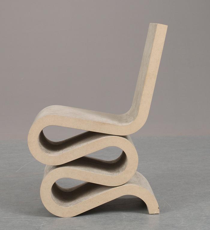 A Frank O. Gehry "Wiggle Side Chair", for Vitra, Germany.