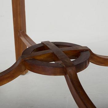 A mid 20th century mahogany veneered table from Nordiska Kompaniet (NK).