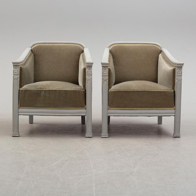 A pair of early 20th century easy chairs.