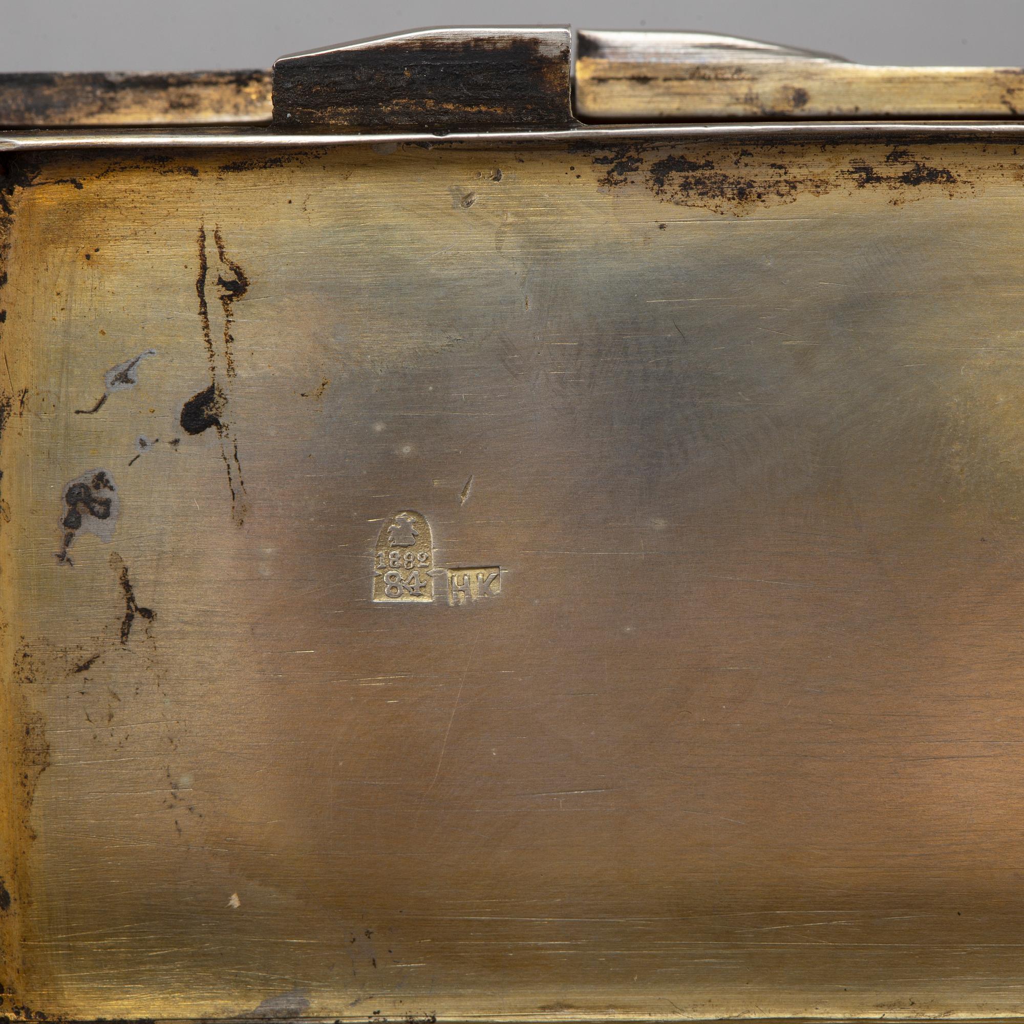 A Russian parcel-gilt silver and niello box, mark of Nicolai Kemper, Moscow 1882.
