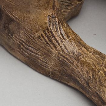 A 20th CENTURY TERRACOTTA DOG.