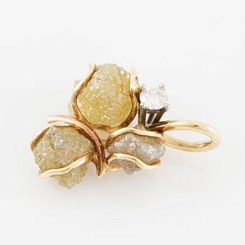 Pendant in 18K gold with rough diamonds and a round brilliant-cut diamond.