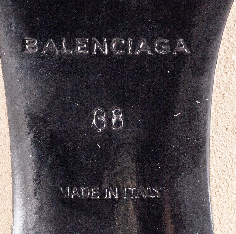A pair of Balenciaga beige suede shoes size 38.