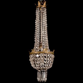An early 20th century cut glass chandelier.