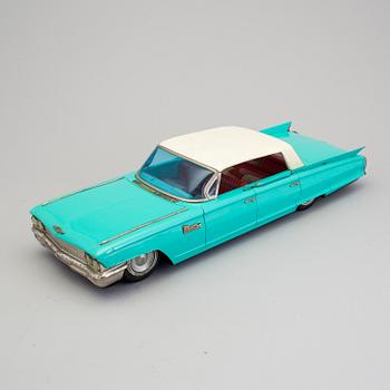 A tinplate Ichiko Cadillac Japan ca 1962.