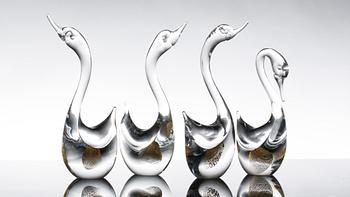 A SET OF FOUR ANTONIO DA ROS GLASS SWANS FOR CENEDESE MURANO, later part of the 20th century.