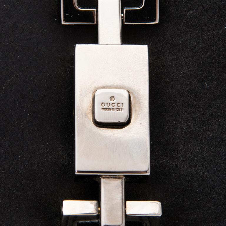 A Black Leather Jackie Bag.