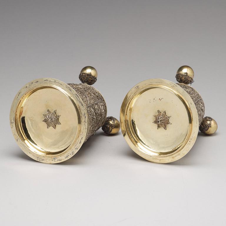 A pair of Swedish 17th century filigree and parcel-gilt silver beakers and covers, mark Rudolf Wittkopf, Stockholm 1698.