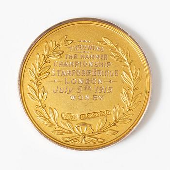 A medal, 15K gold, England, 1913.
