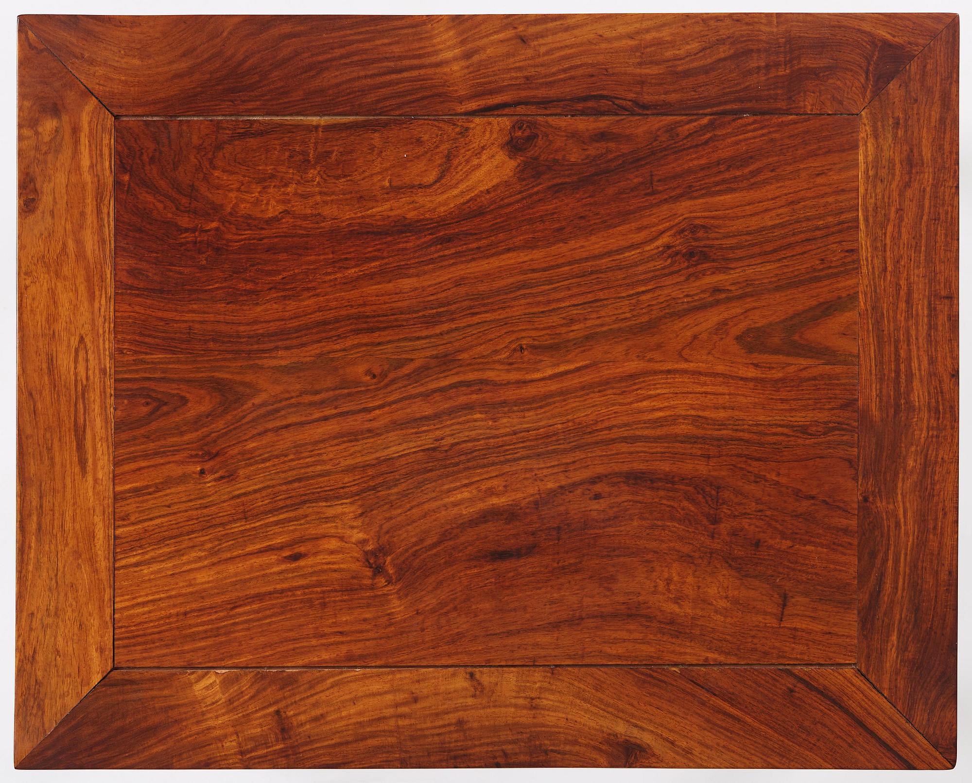 A Chinese huali square table with a lotus-leaf waist, 20th century.