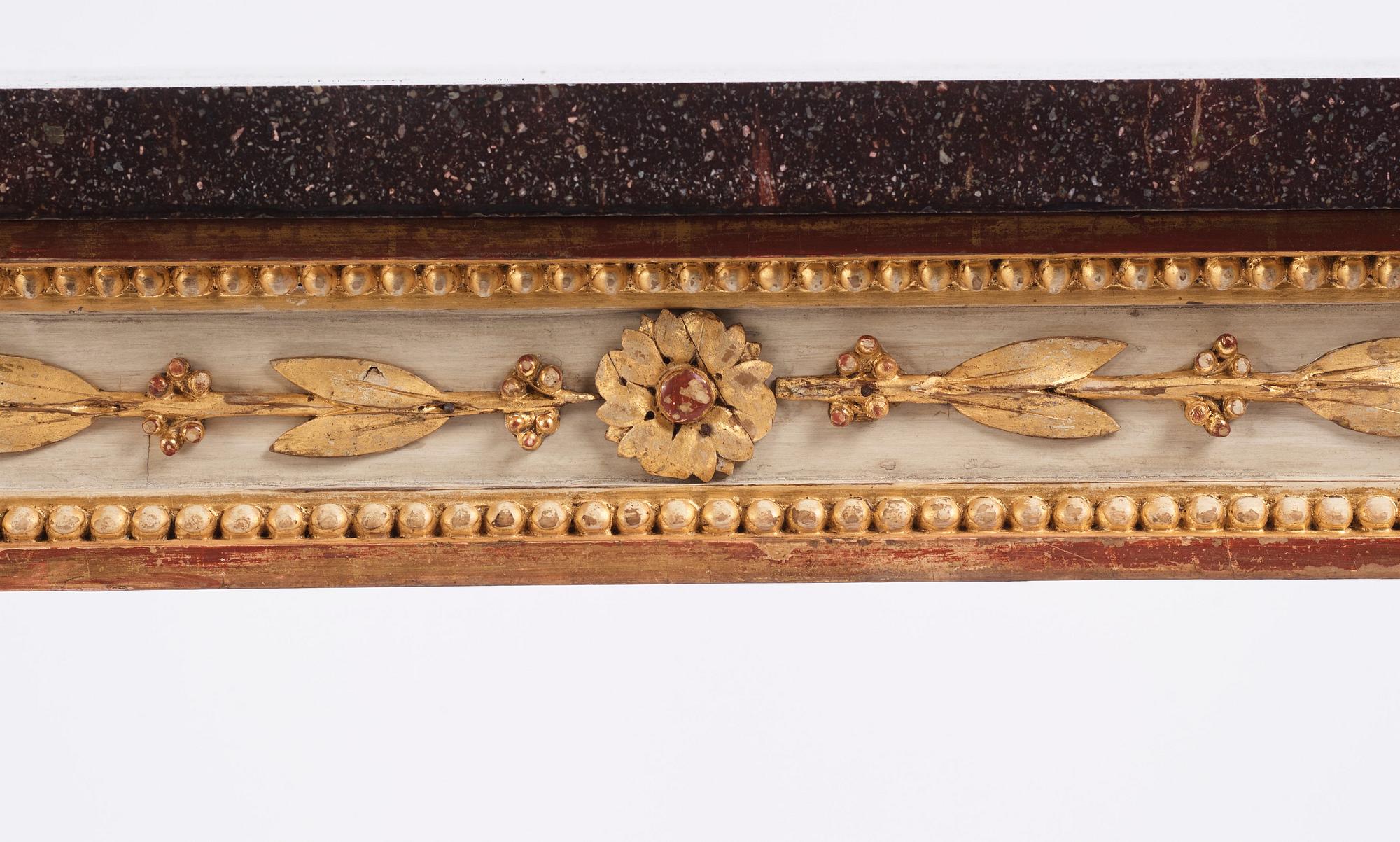 A late Gustavian console table in the manner of P Ljung, late 18th century. Stone top in porphyry.