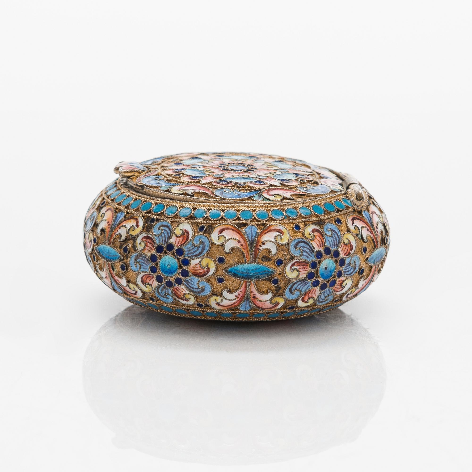 A gilt silver cloisonné enamel pill box, maker's mark of D. Nikitin, Moscow 1908-17.
