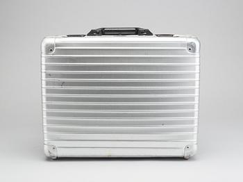 A set of three Rimowa bags later part of the 20th century.