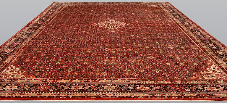 A carpet, Hosseinabad, approx. 510 x 384 cm.