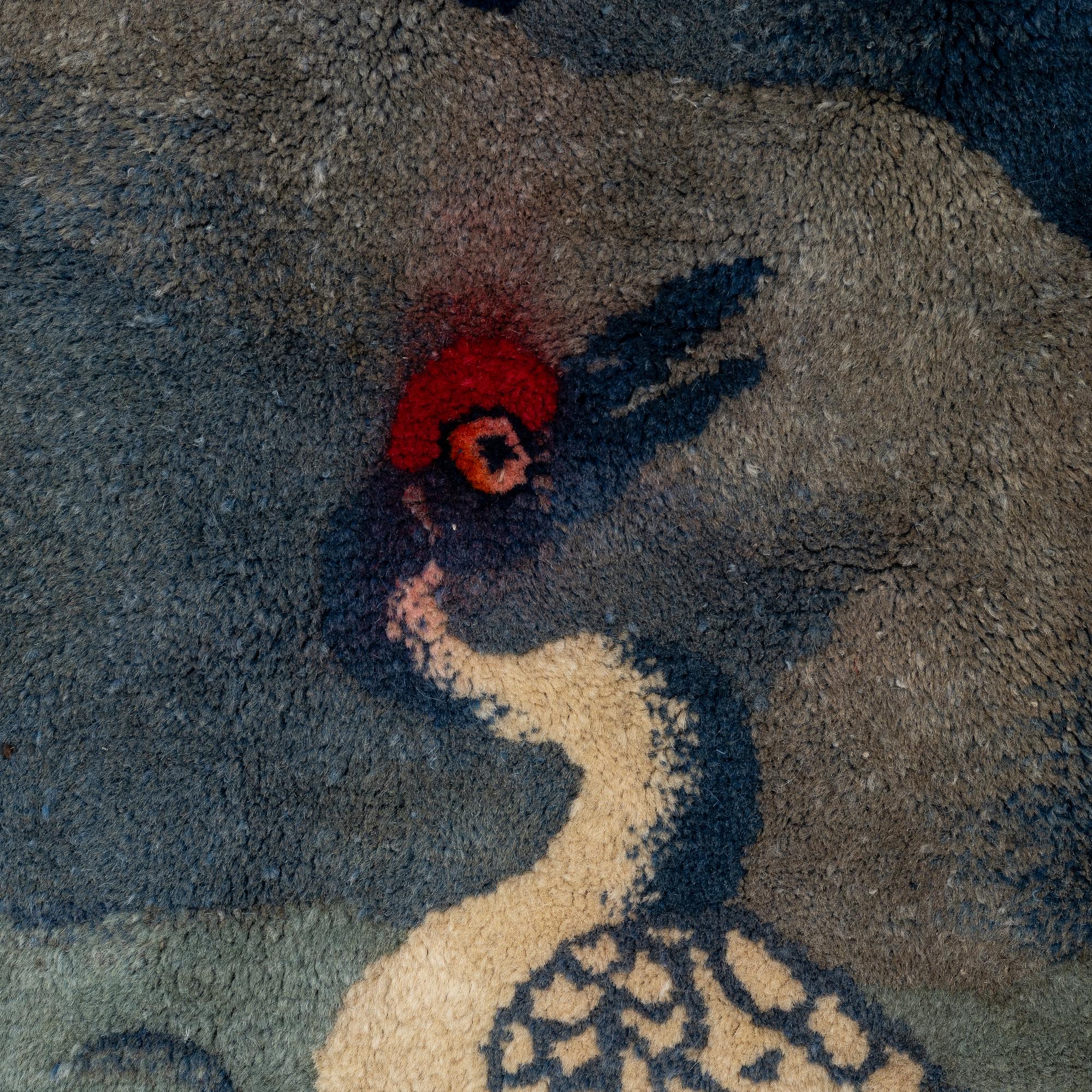 A Chinese rug, semi-antique /old, 191 x 157 cm.