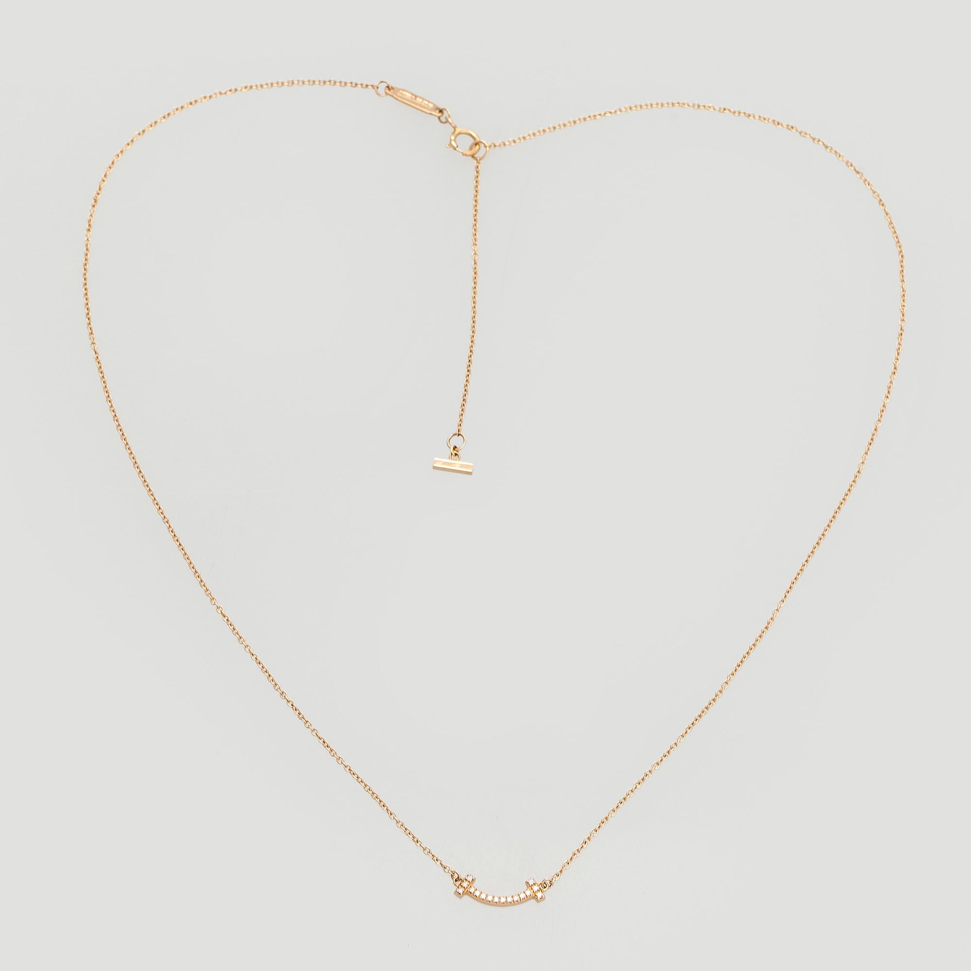 Tiffany & Co, halsband, "T Smile", 18K guld och briljantslipade diamanter.