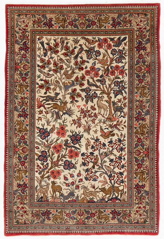 A figural Ghom, rug, c. 160 x 107 cm.