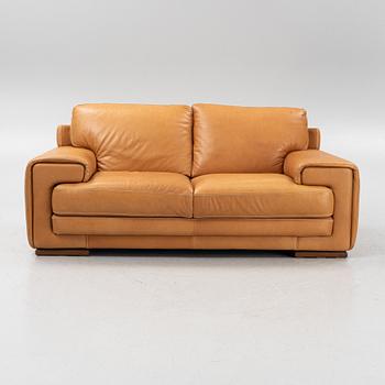 A leather upholstered sofa from Natuzzi.