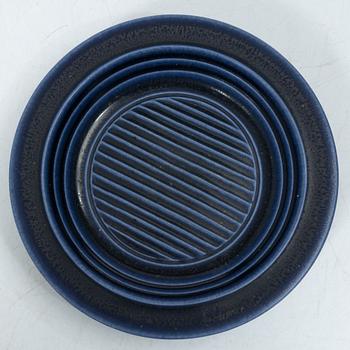 Kåge Verkstad, a set of three ceramic bowls and a small dish, Gustavsberg, Sweden, 1957-61.