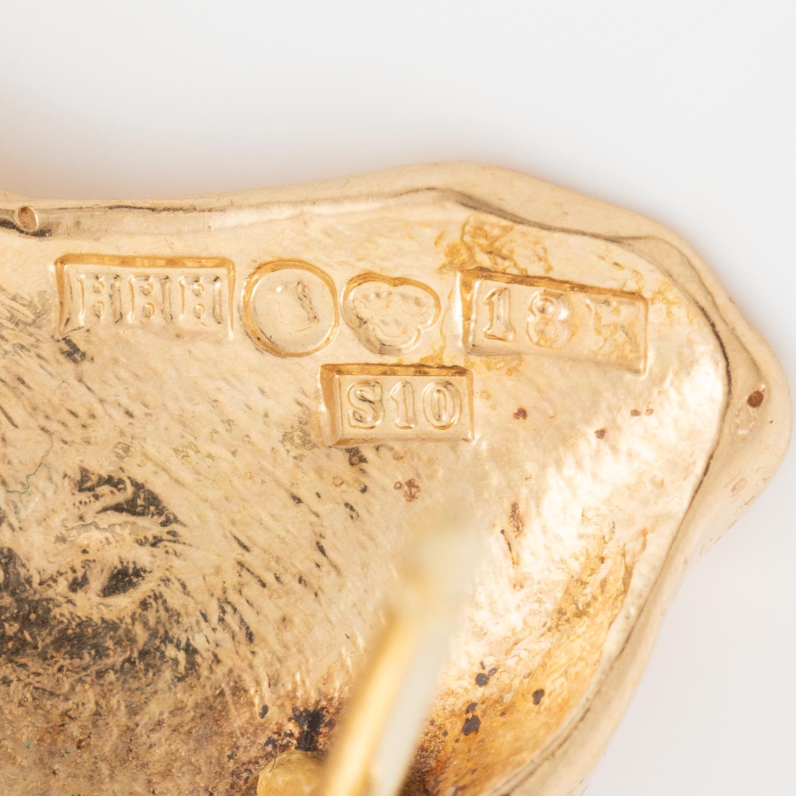 Örhängen 18K guld med briljantslipade diamanter.