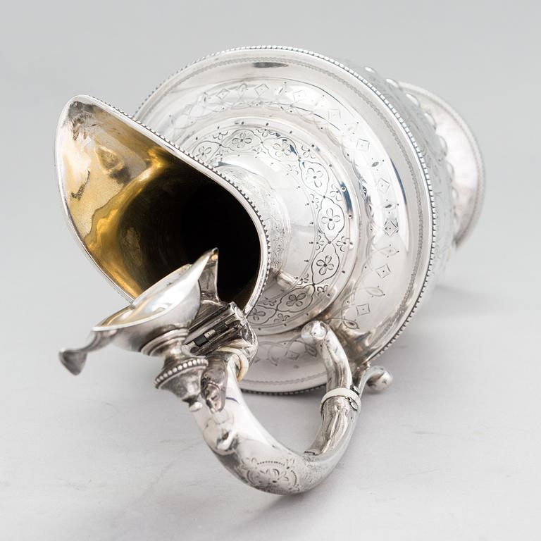 MARTIN, HALL & CO, A sterling silver pitcher, Sheffield 1873.