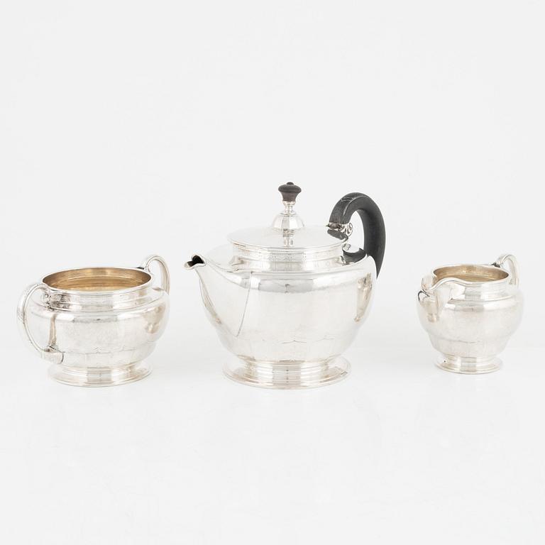A Norwegian Silver Teapot, Sugar Bowl and Creamer, mark of David Andersen, Oslo circa 1923.