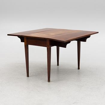 Table with drop leaves, 19th century.