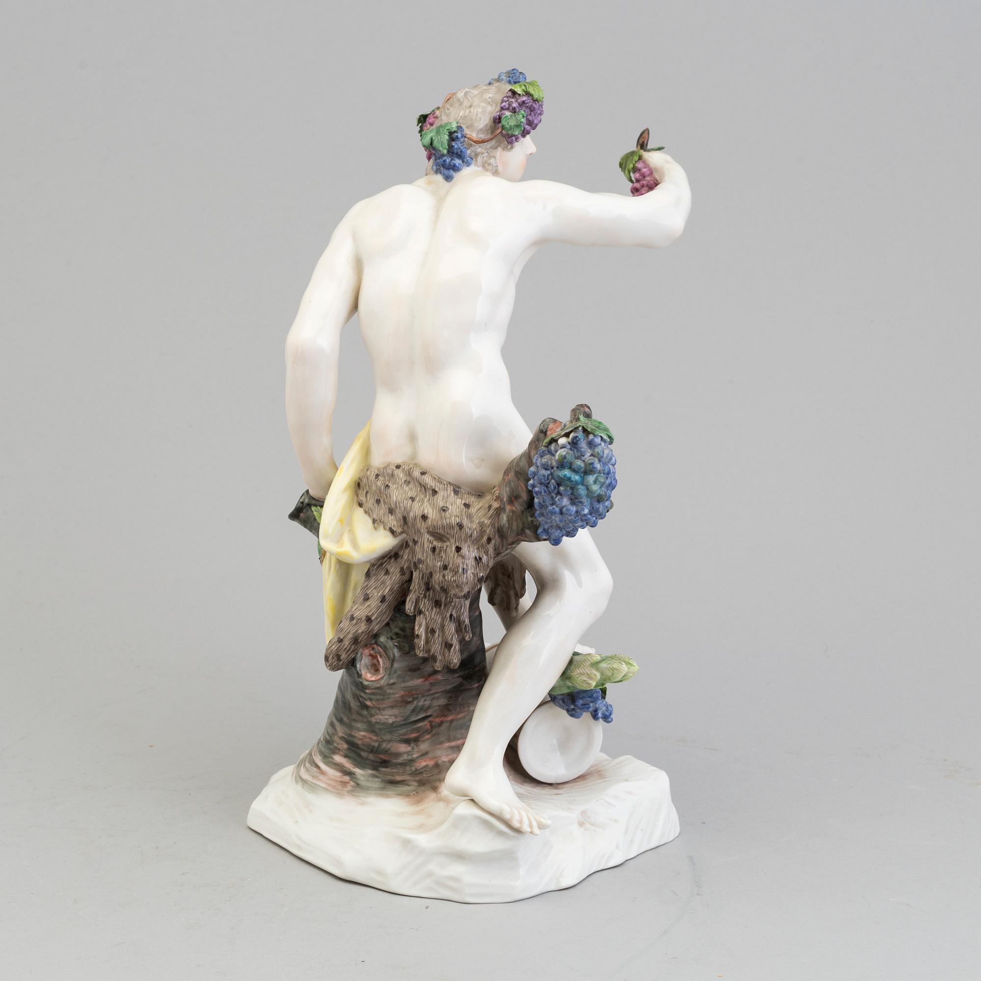 A 20th century porcelain figure of "Bacchus",  model after Dominik Auliczek, Nymphenburg, Germany.