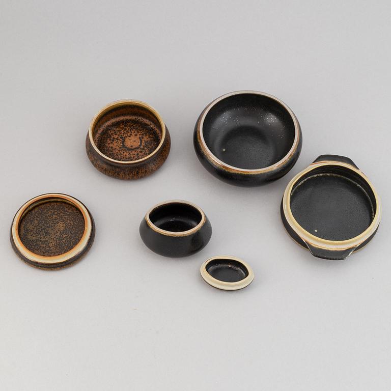 Carl-Harry Stålhane, a set of three stoneware bowls with lid and two bowls for Rörstrand.