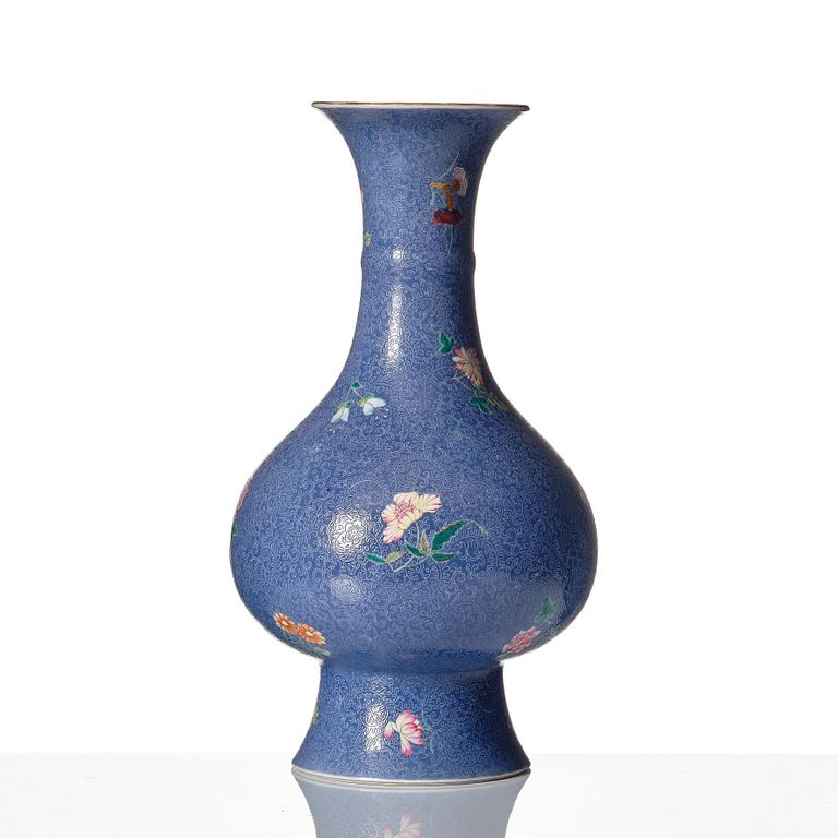A famille rose sgrafitto vase, Qing dynasty, 19th Century with Qianlong mark.