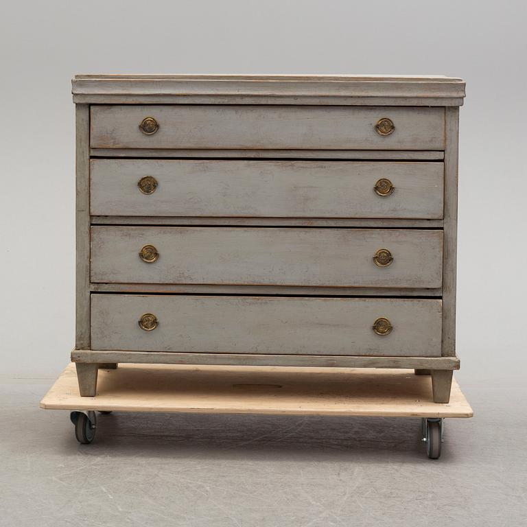 A mid 19th century painted chest of drawers.