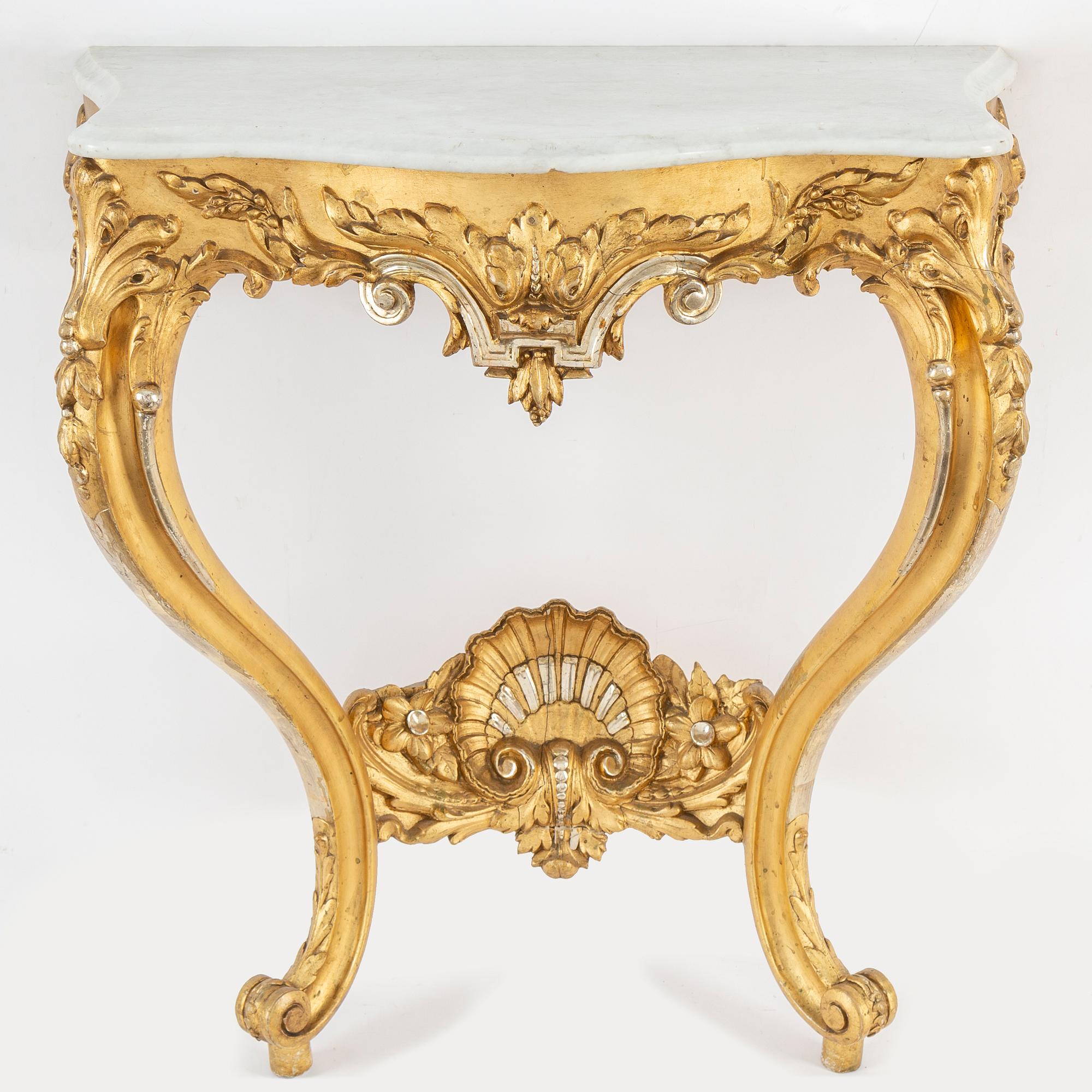 A late 19th century mirror and console table.