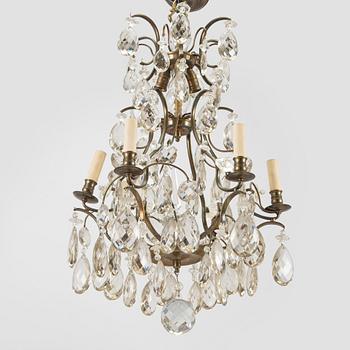 A rococo style chandelier, early 20th century.