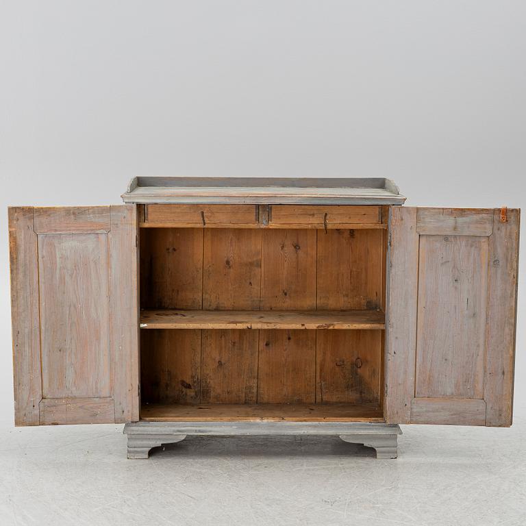 A Gustavian cupboard, circa 1800.