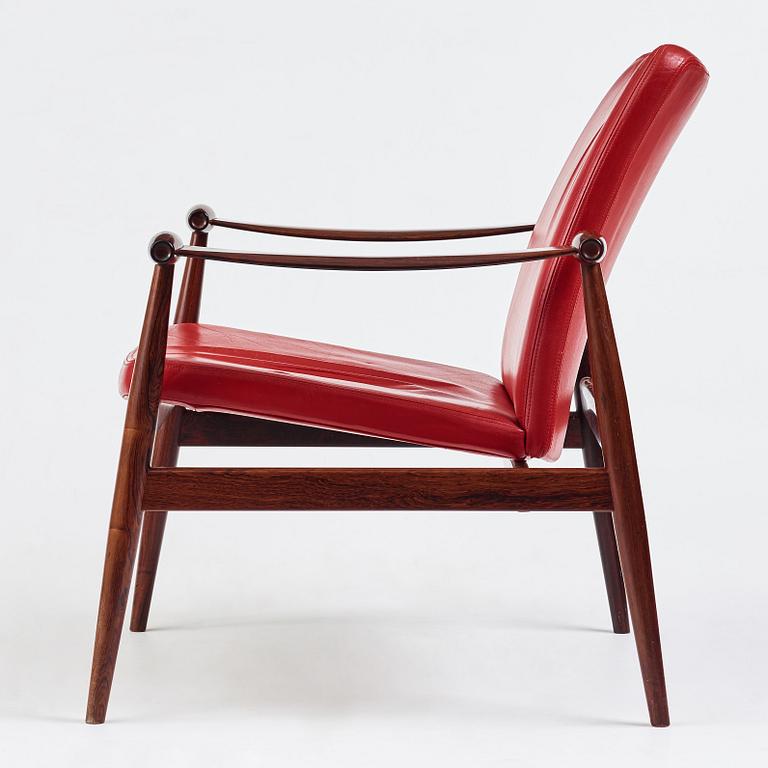 Finn Juhl, a model 133 rosewood easy chair from France & Son, Denmark.