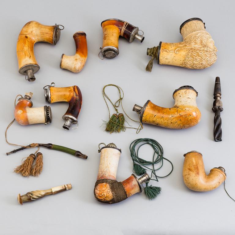 A collection of early20th century pipe heads.