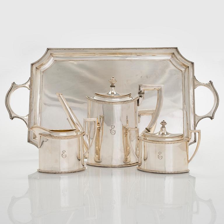 An early 20th century 4- piece sterling silver empire coffee set, C.G. Hallbergs Guldsmeds AB, Stockholm.