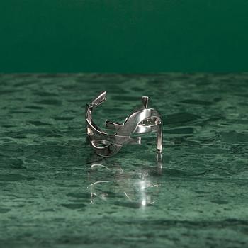 A Bangle by Yves Saint Laurent.