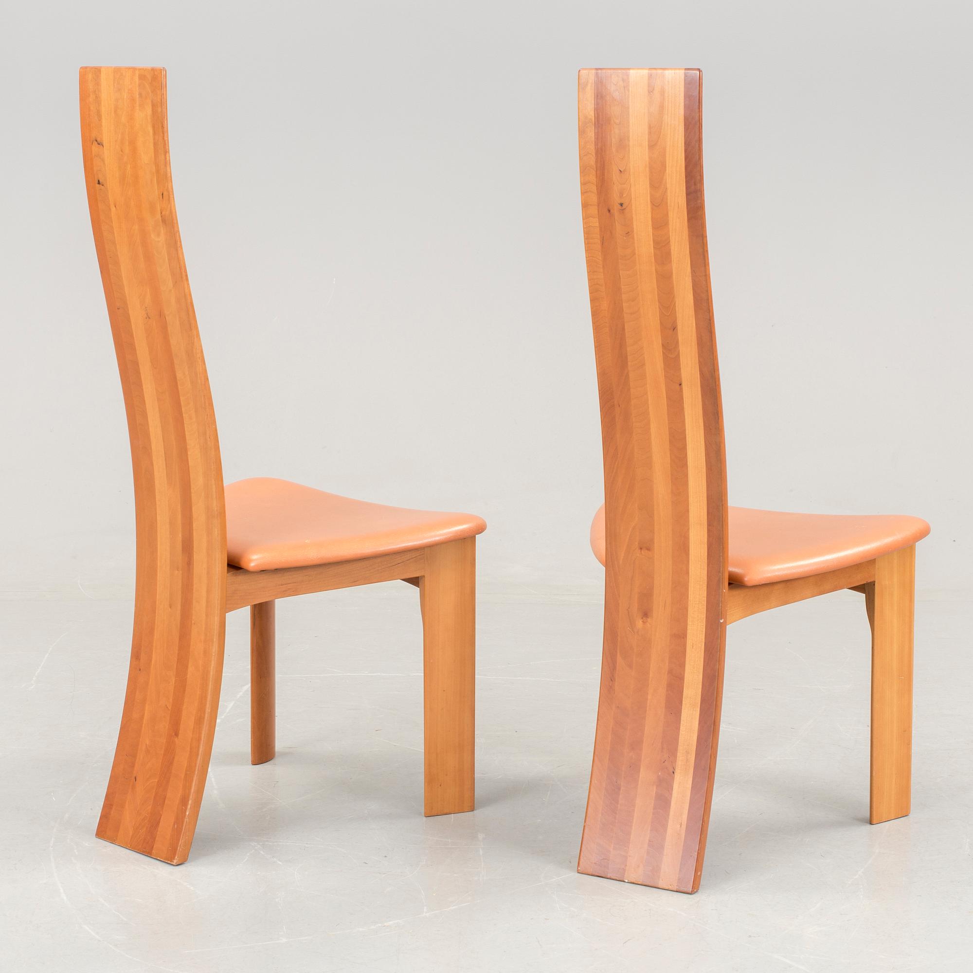 A Bob van den Berghe "Cirkante" table and 6 "Iris" chairs, Van den Berghe-Pauvers, Gent, 21h Century.