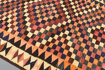A kilim carpet, ca 333 x 163 cm.