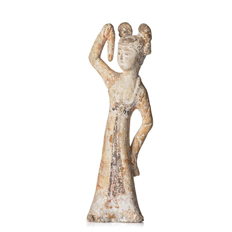 A painted pottery figure of a female dancer, Tang dynasty (608-906).