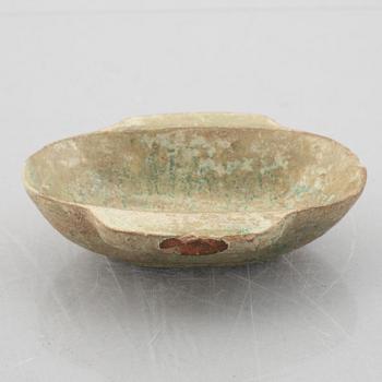 A Chinese glazed ceramic dish, Han dynasty (206 B.C-220 A.D.).
