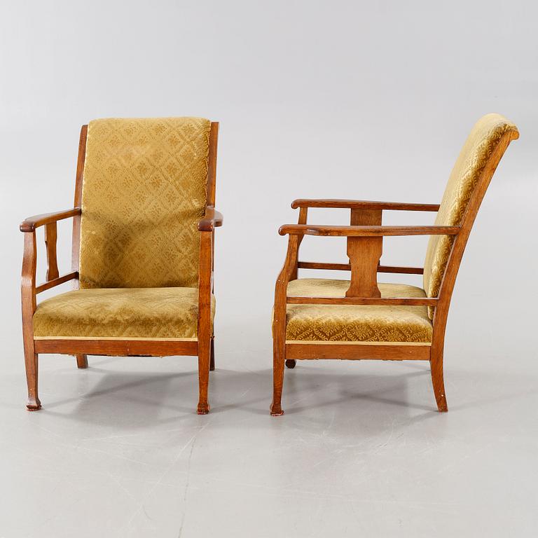 A pair of early 20th century armchairs.