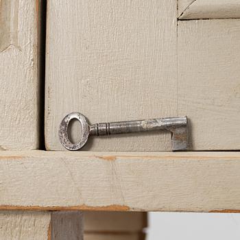 Display cabinet, early 20th century.