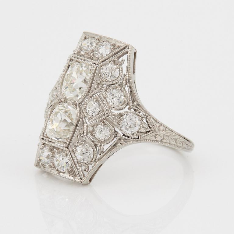 A RING set with old-cut diamonds.