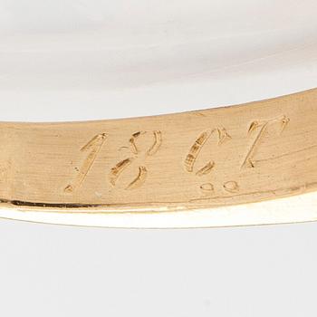 Ring in 18K gold with a brilliant-cut diamond.