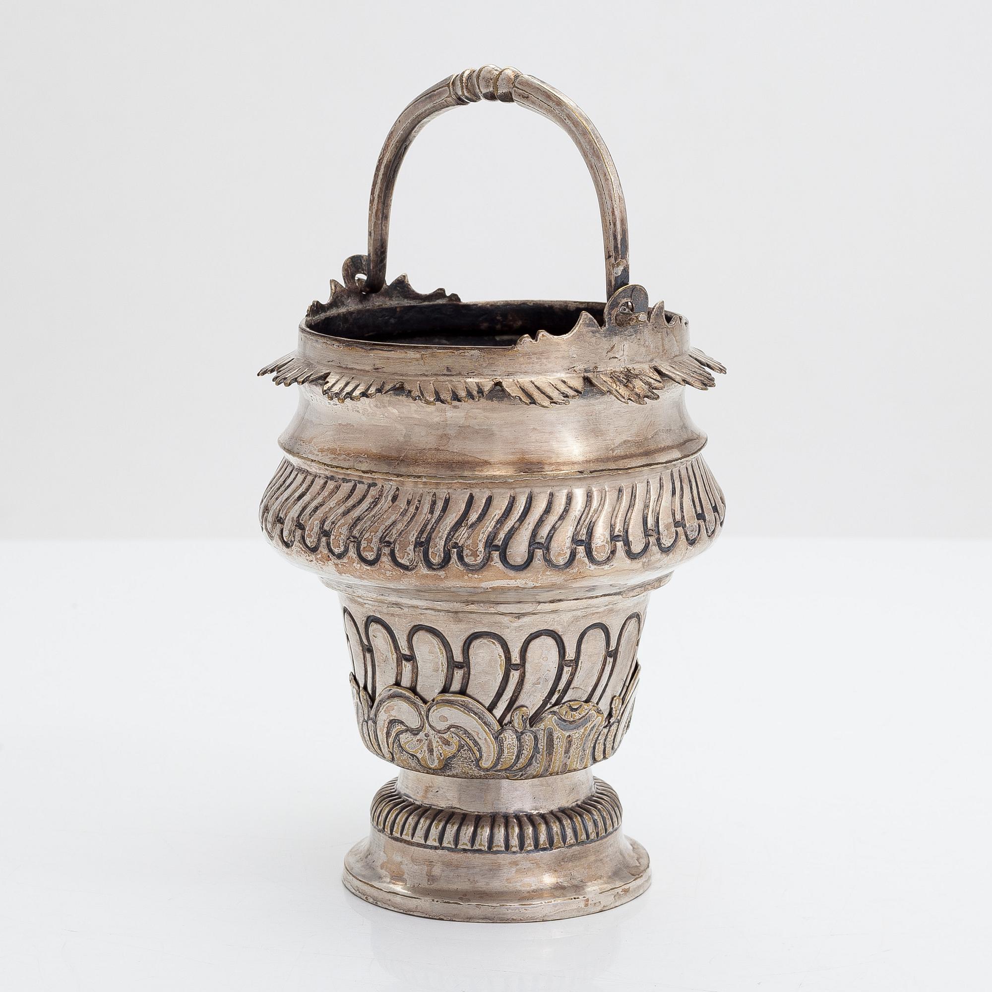 A silver plated brass Holy water bowl stamped L.G and dated 1774.